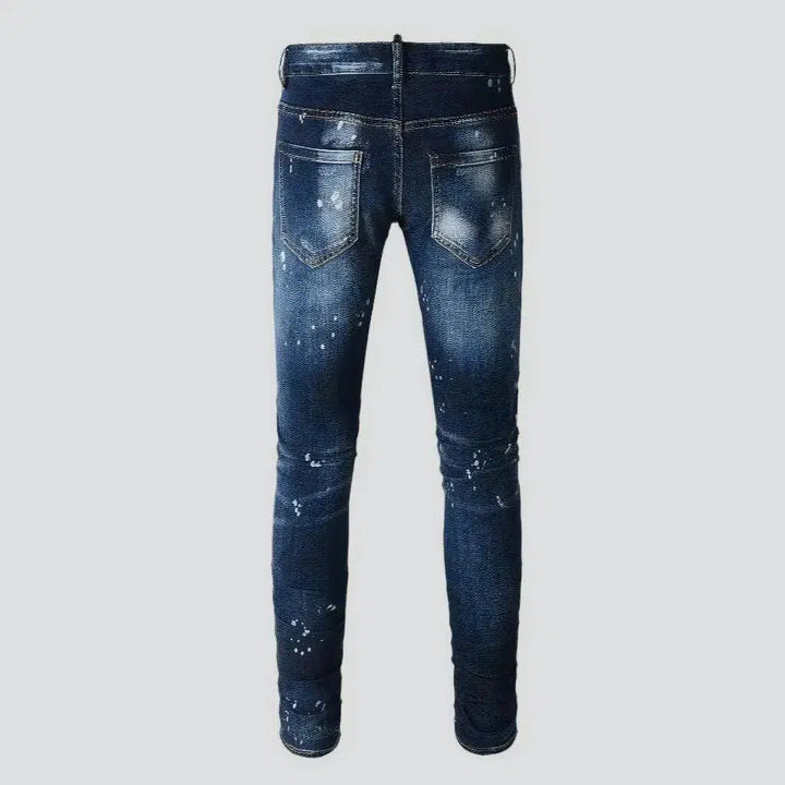 Dark-wash men's grunge jeans