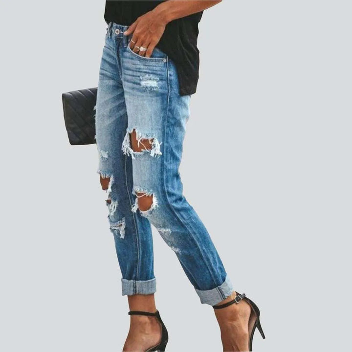Light blue ripped women's jeans